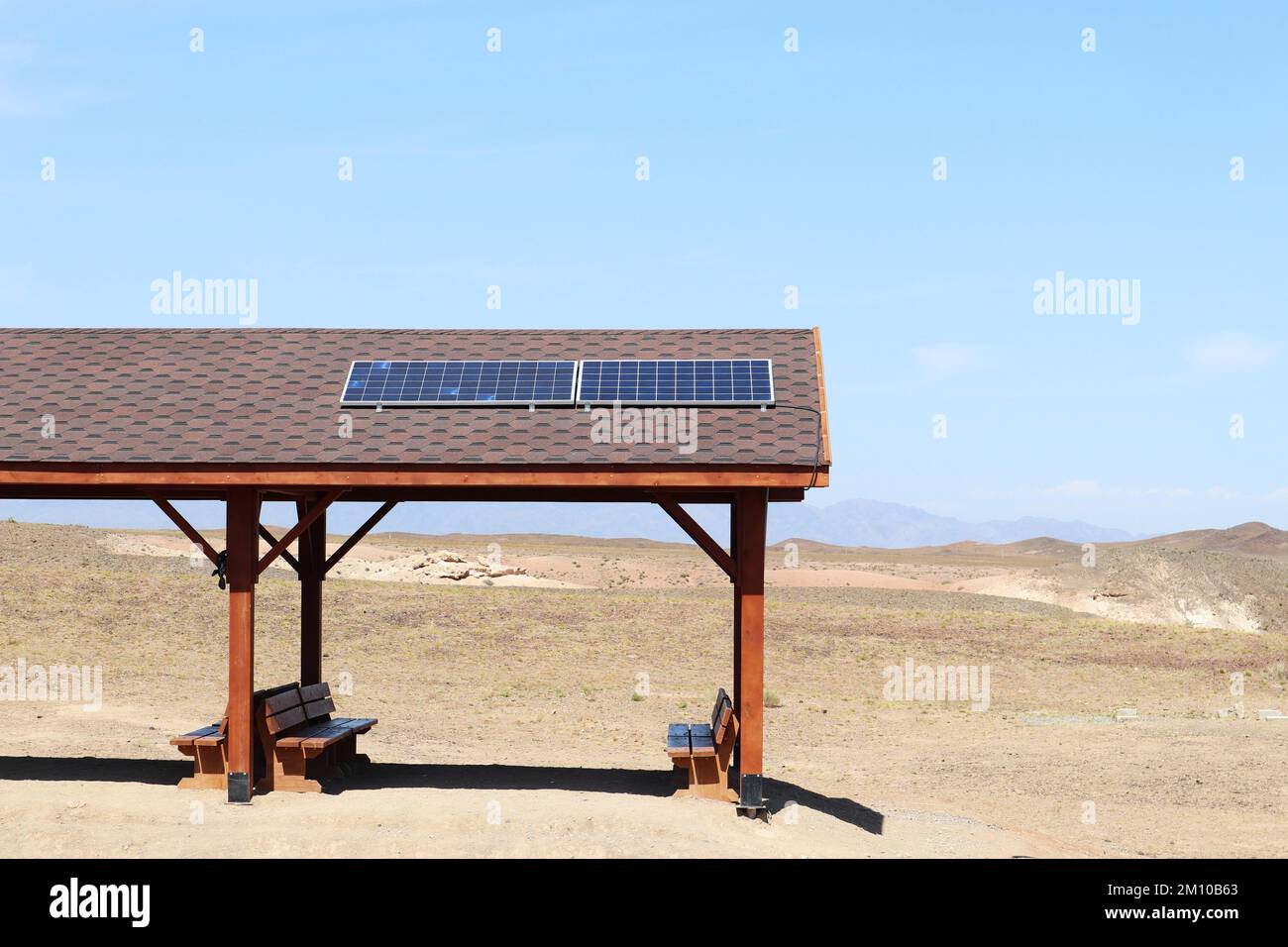 summer gazebo with solar panel on the roof Stock Photo Alamy