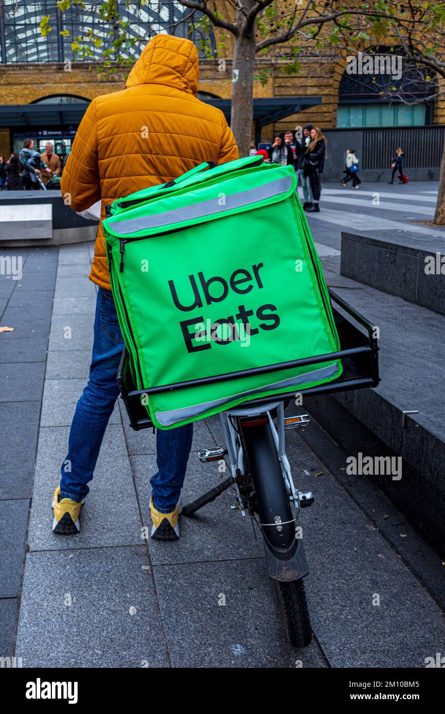 Uber Eats Food Delivery Courier in Central London. Stock Photo