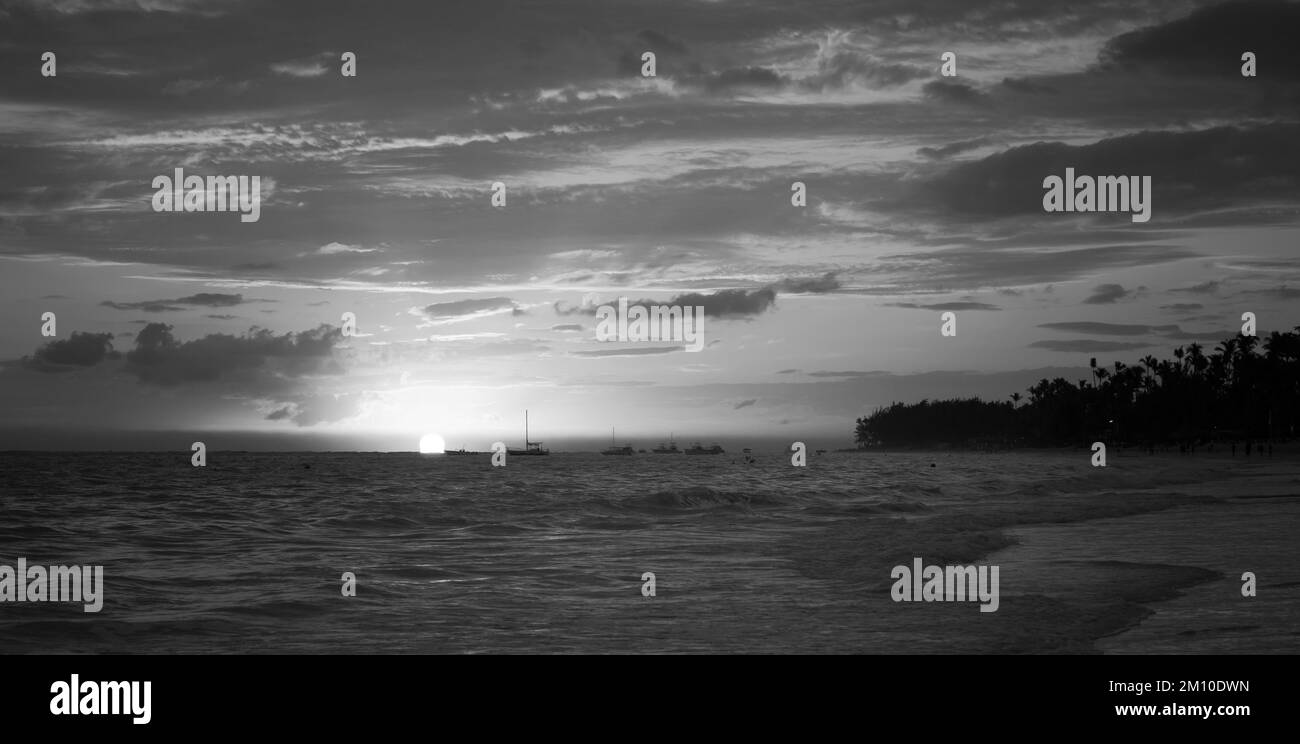 Atlantic ocean coast landscape with shore waves. Dominican republic, Bavaro beach, black and white panoramic landscape photo Stock Photo