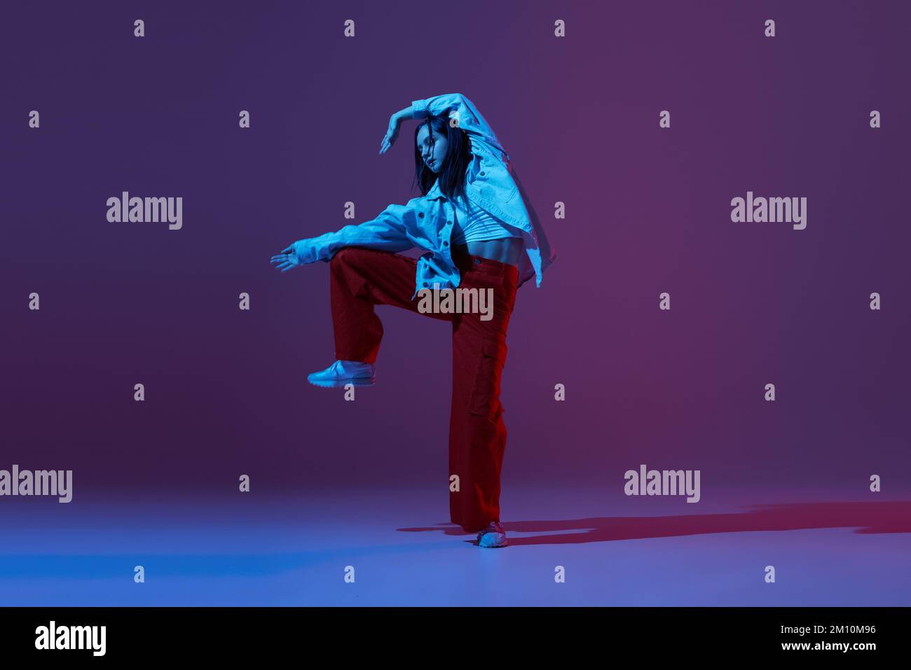 Flexible young girl, contemp dancer dancing hip-hop or experimental ...