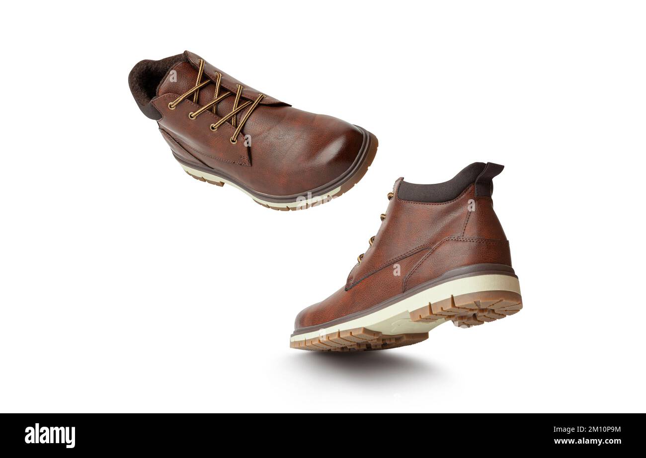 Brown leather boots, Men’s brown ankle boots. One shoe in flight