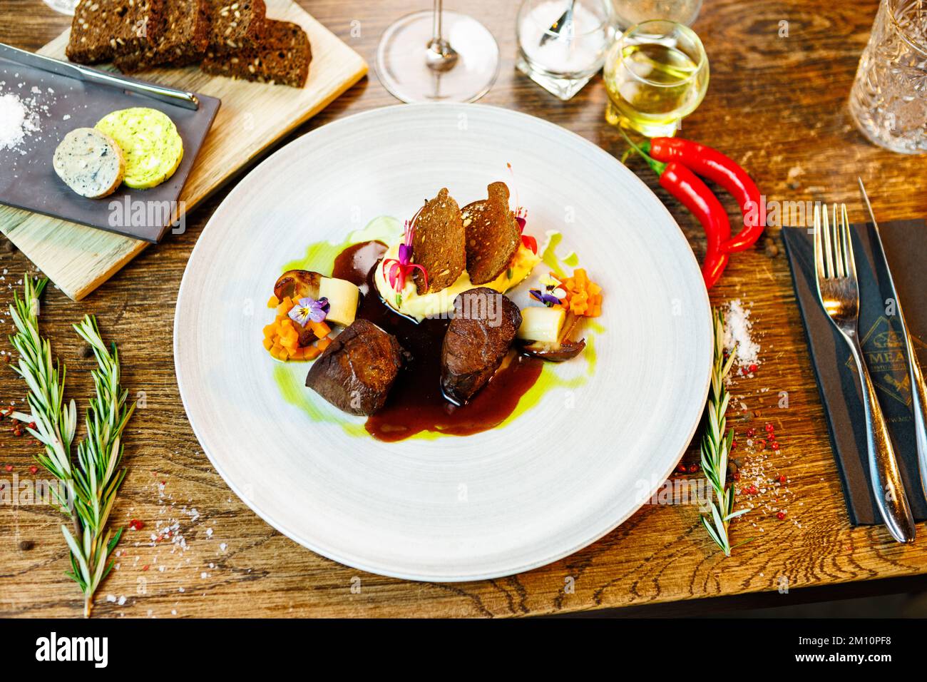 Deer tenderloin. Trufflepotato puree, porcini mushrooms, baked leek and carrot, juniper bread