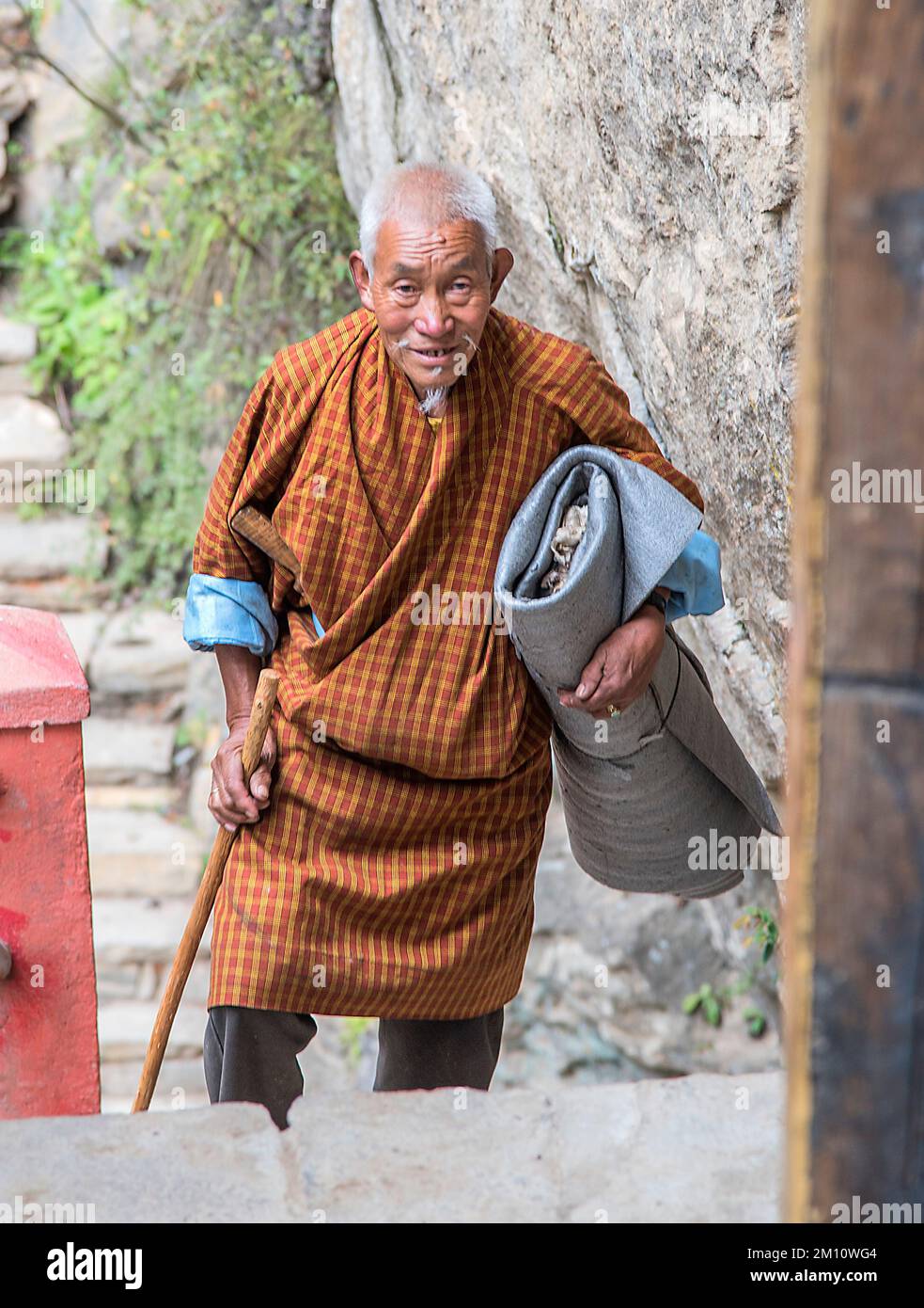 Pilgrim hiking to Tiger's Nest Bhutan Stock Photo