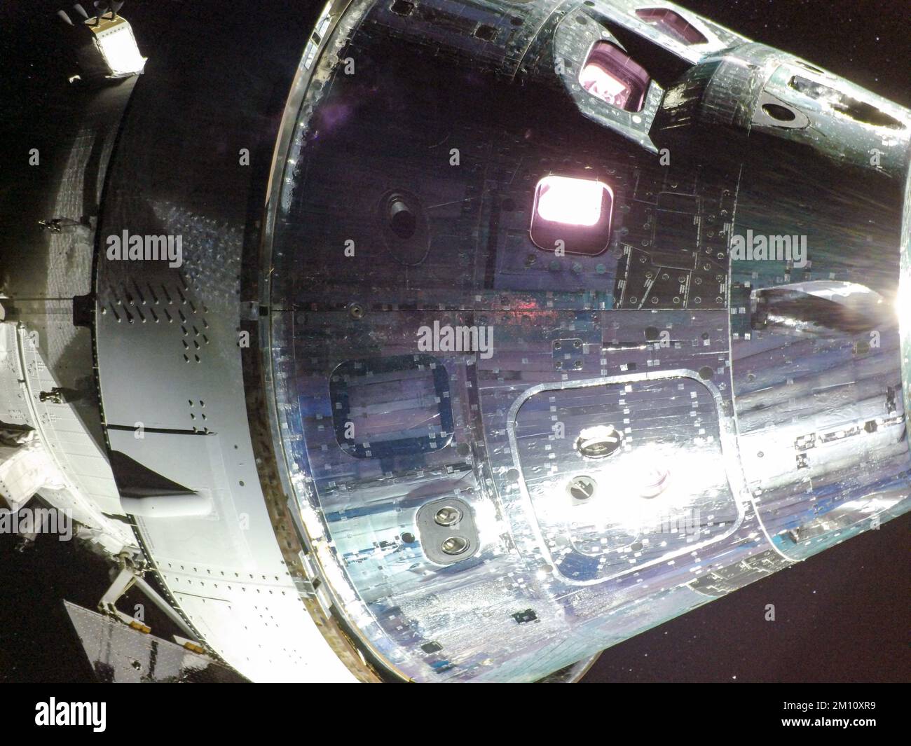 EARTH, THE MOON - 05 December 2022 - On flight day 20 of the Artemis I mission, the Orion capsule on the day of the return powered flyby of the Moon. Stock Photo