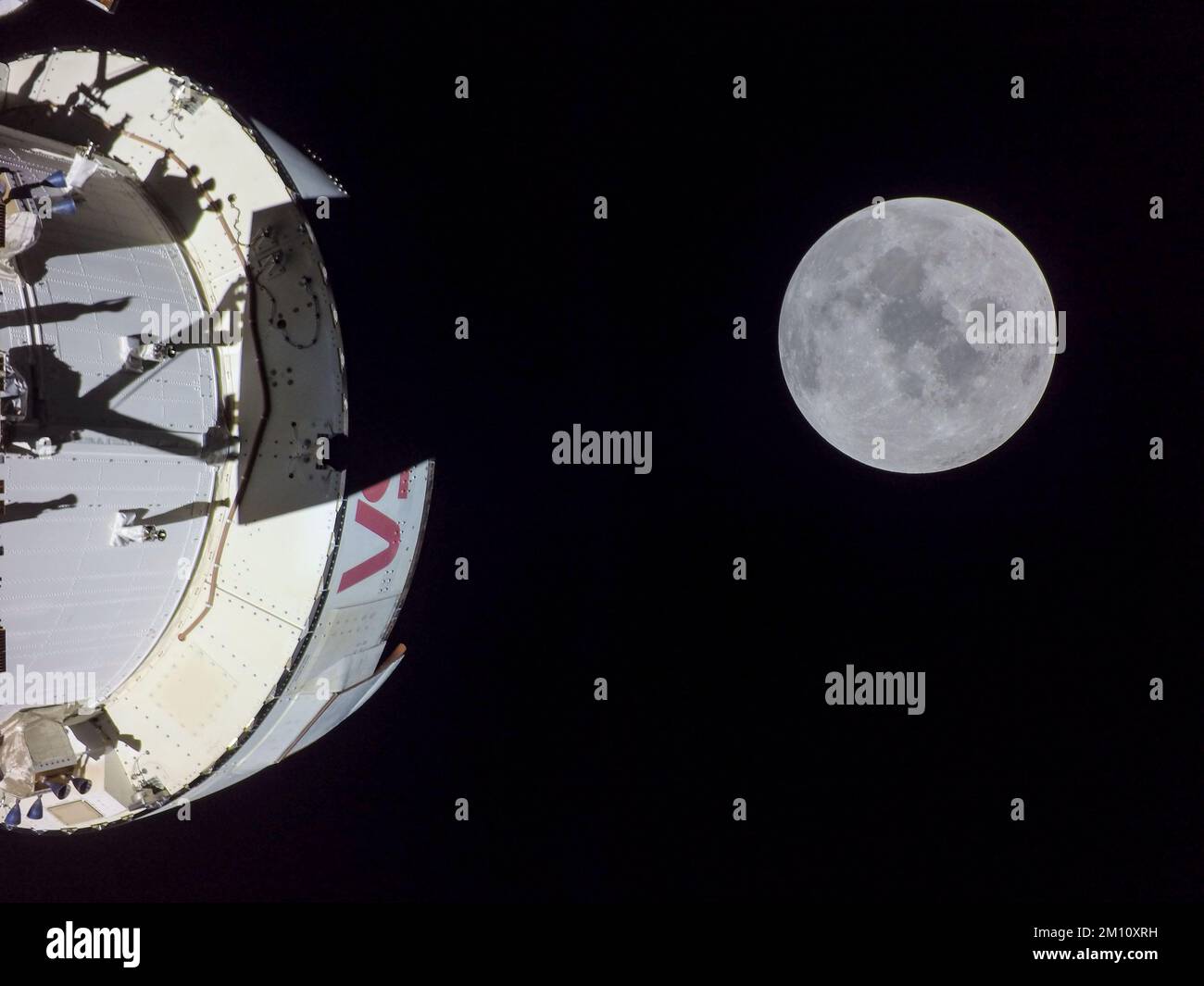 EARTH, THE MOON - 05 December 2022 - On flight day 20 of the Artemis I mission, Orion captured the Moon on the day of the return powered flyby. The bu Stock Photo