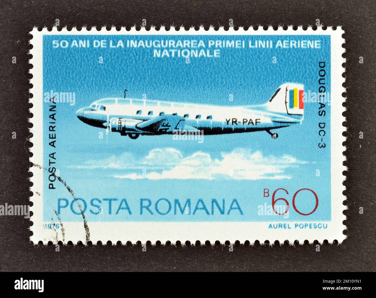 Cancelled postage stamp printed by Romania, that shows Douglas DC-3, Romanian Airlines, 50th Anniversary, circa 1976. Stock Photo