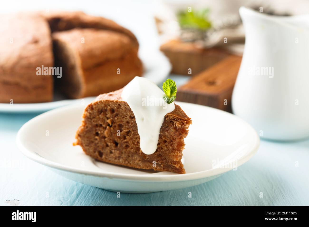 Homemade chocolate cake with cream sauce Stock Photo - Alamy