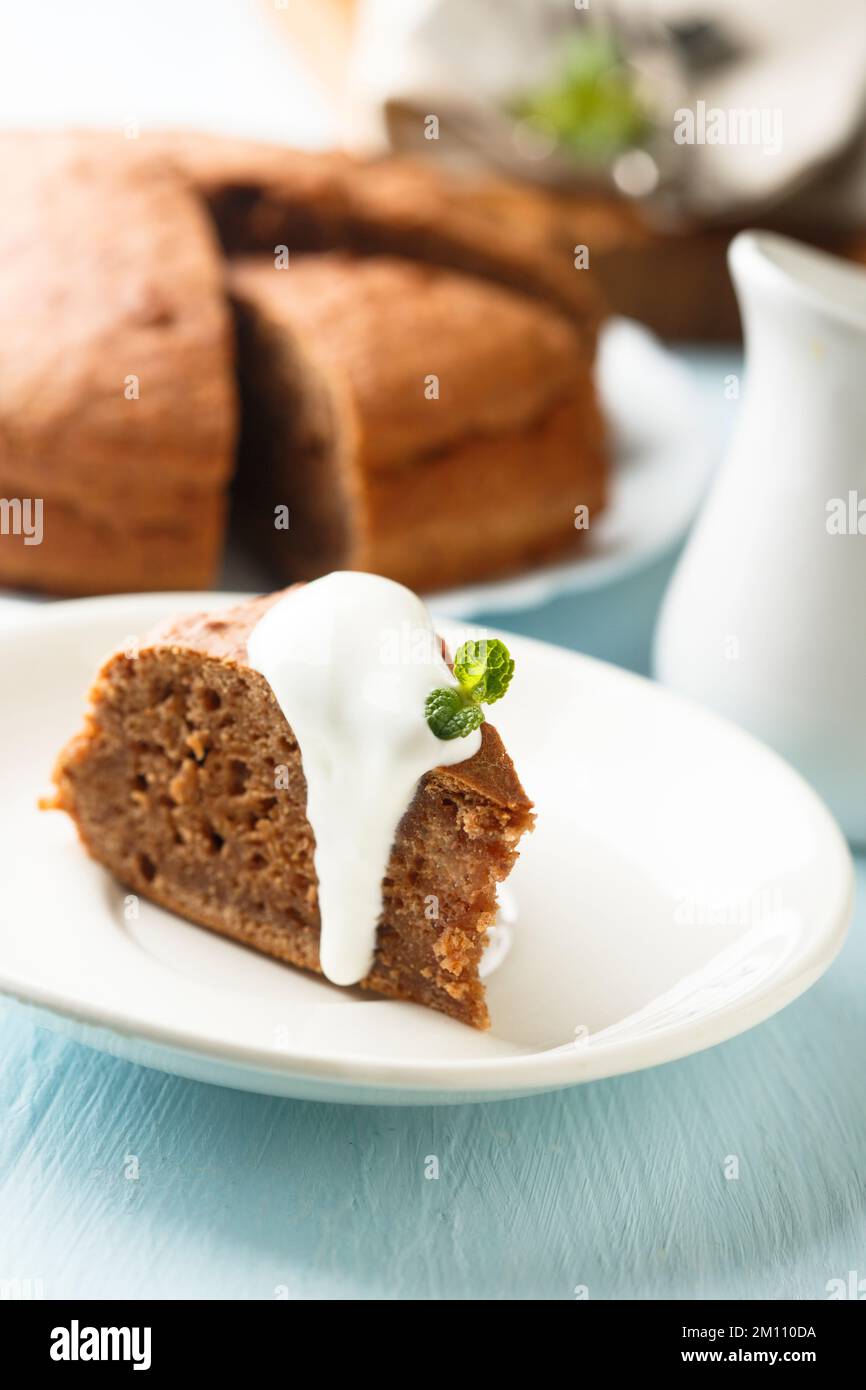 Homemade chocolate cake with cream sauce Stock Photo - Alamy