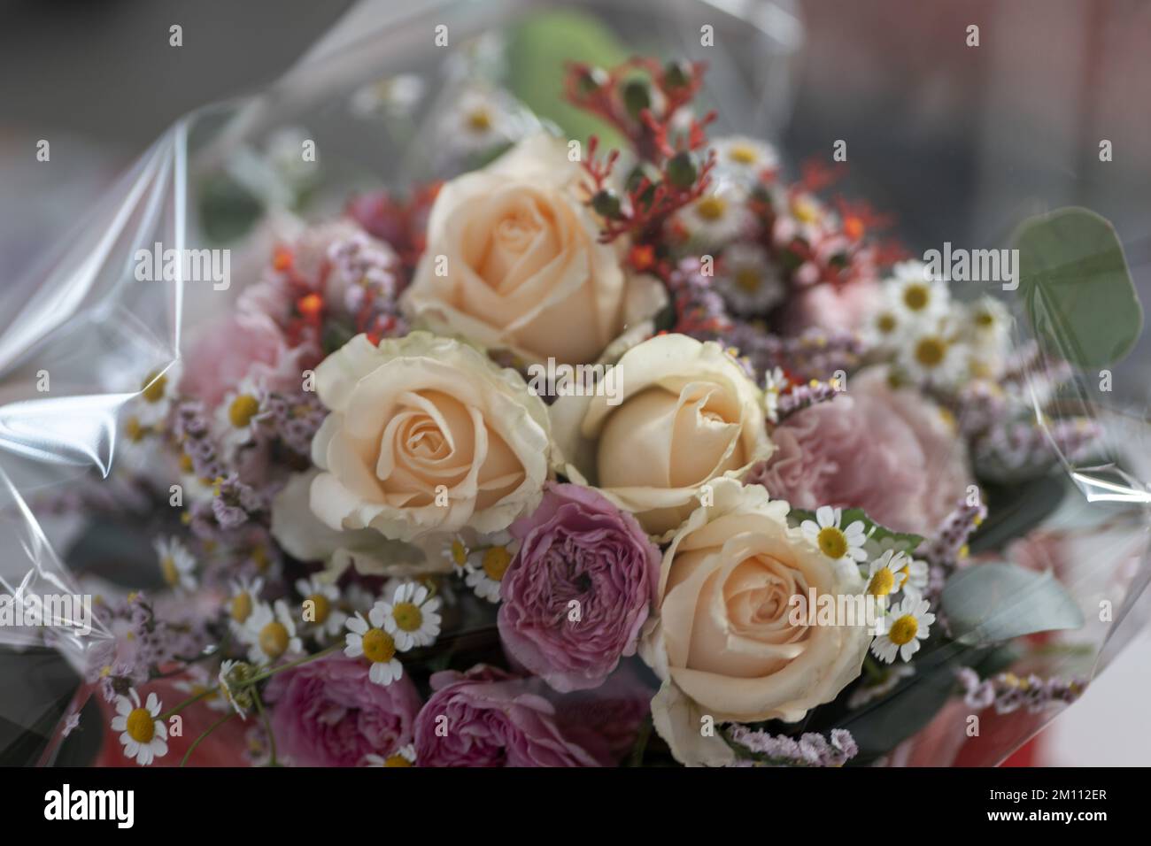 Small Roses Bouquest pink roses and small flower wedding bouquet Stock Photo - Alamy