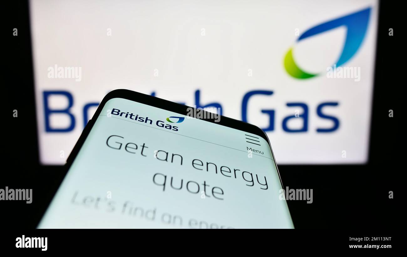 Mobile phone with website of energy company British Gas on screen in