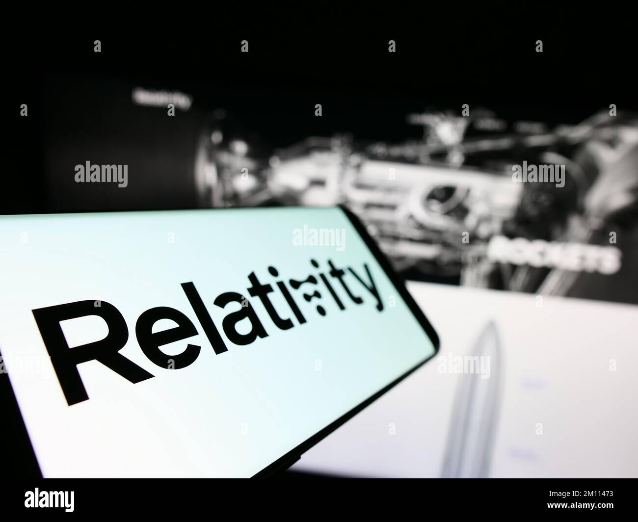 Smartphone with logo of American aerospace company Relativity Space Inc. on screen in front of business website. Focus on left of phone display. Stock Photo