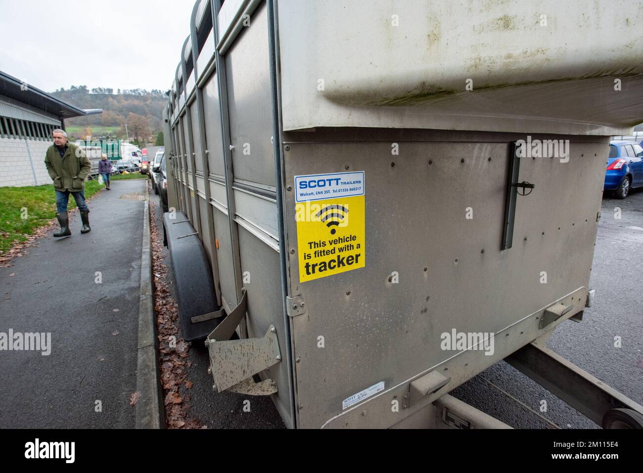 ÔThis vehicle is fitted with a trackerÕ sign  on a livestock trailer. UK Stock Photo