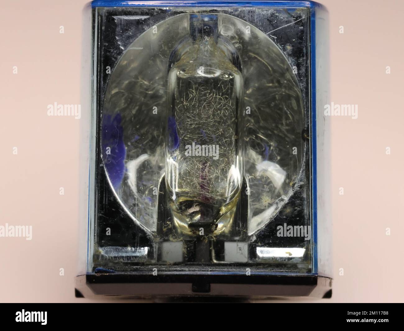 Vintage old camera flash technology showing flash bulb, reflector and