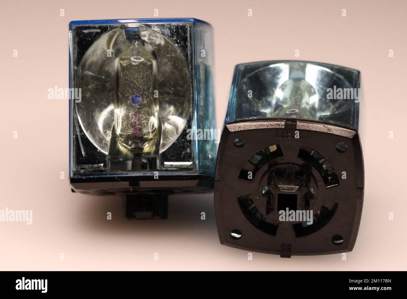 Vintage old camera flash technology showing flash bulb, reflector and