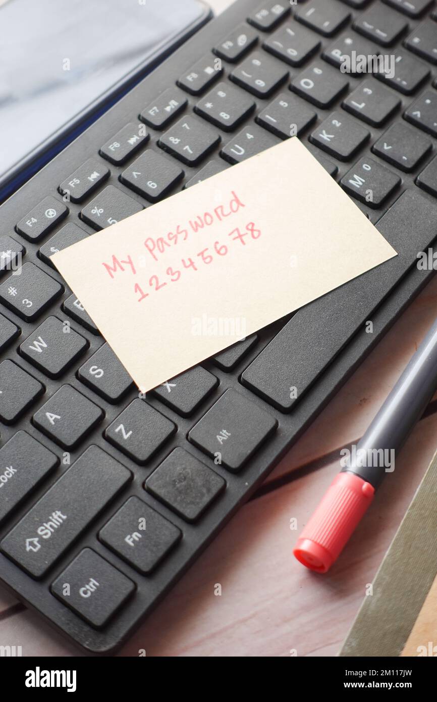 writing password on a sticky note  Stock Photo