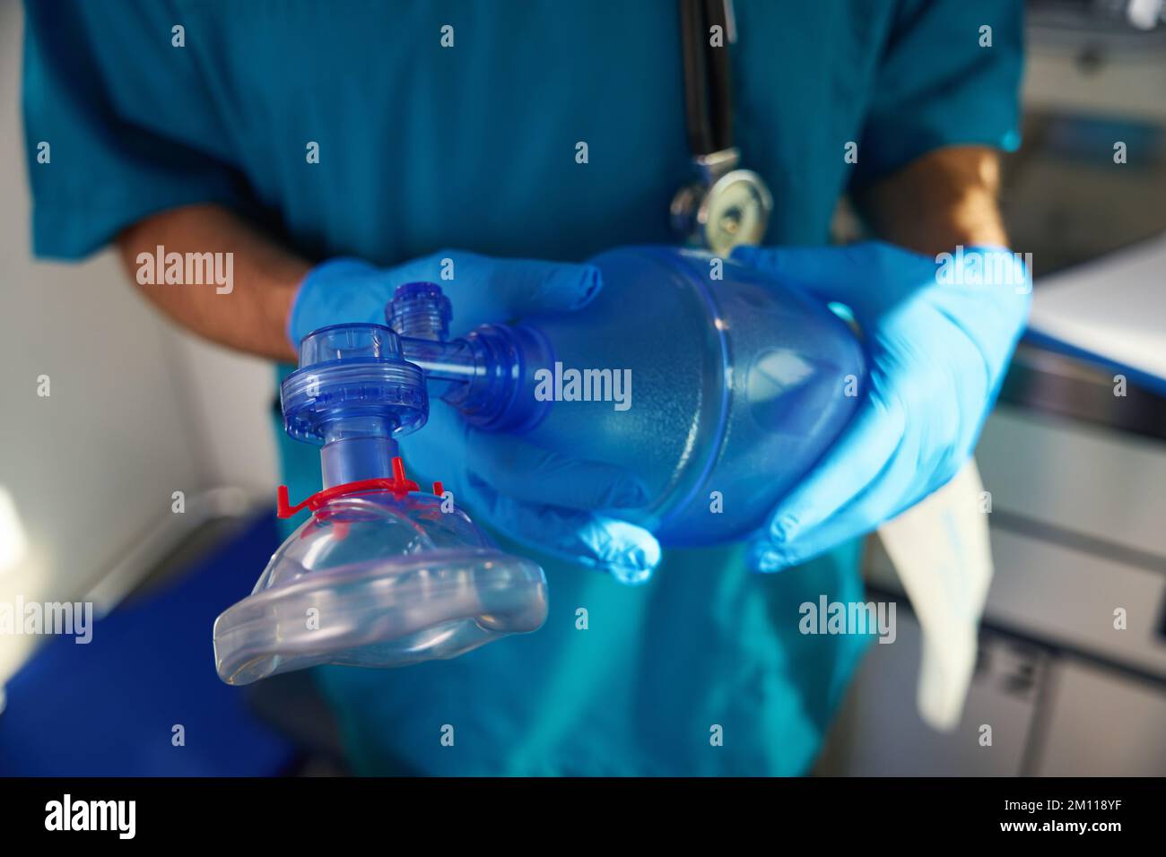 Doctor holds in his hands a device for oxygen resuscitation Stock Photo