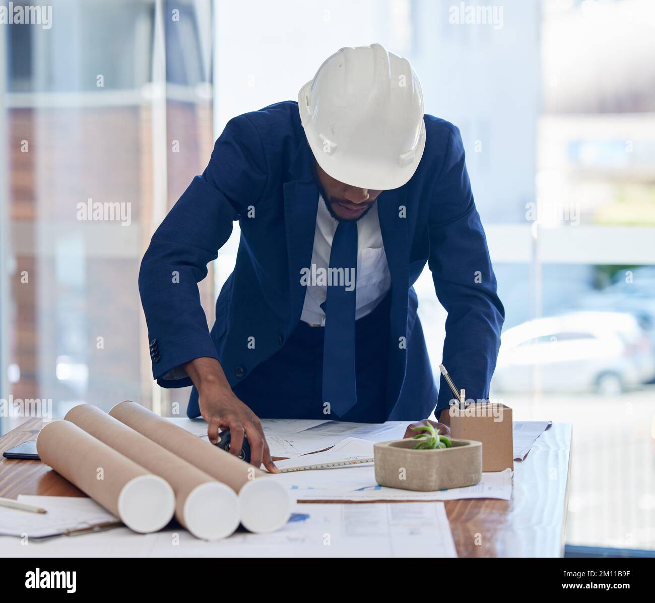 Architect, blueprint and planning, architecture and black man working