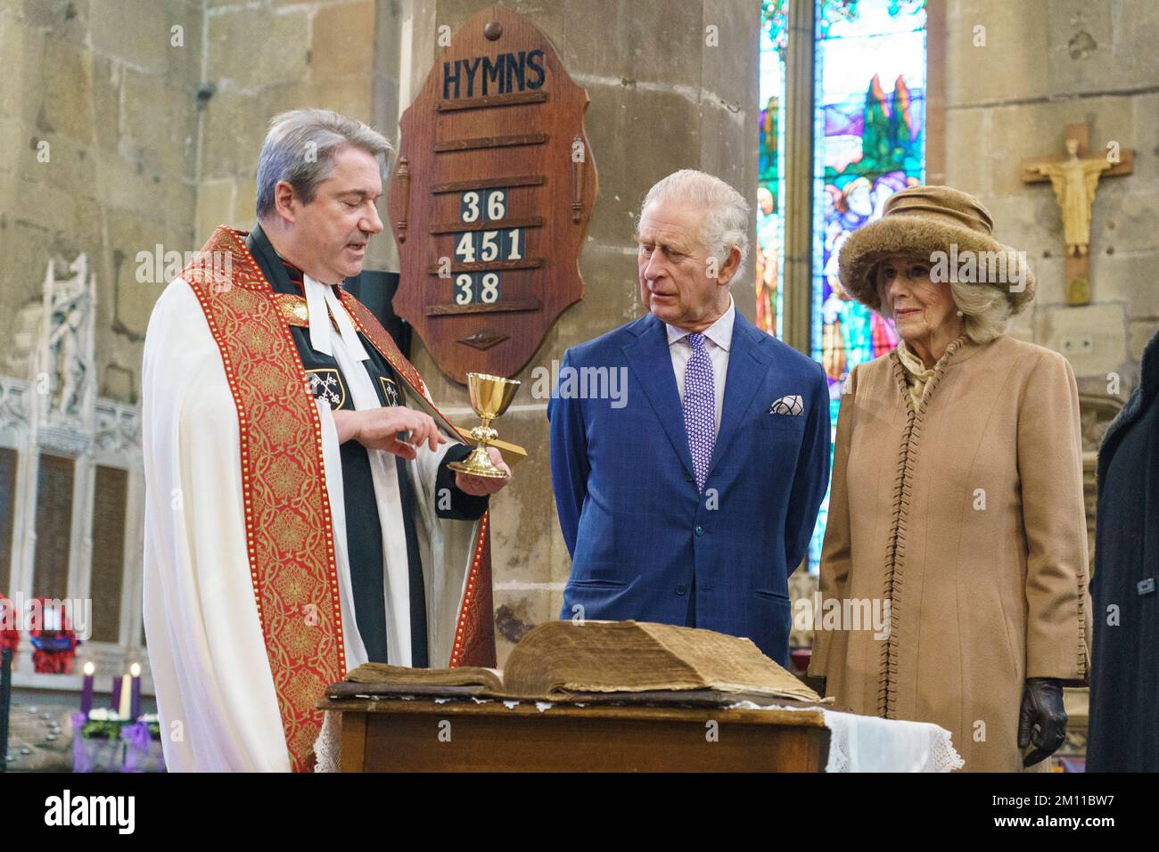 King Charles III and the Queen Consort are shown a first edition King