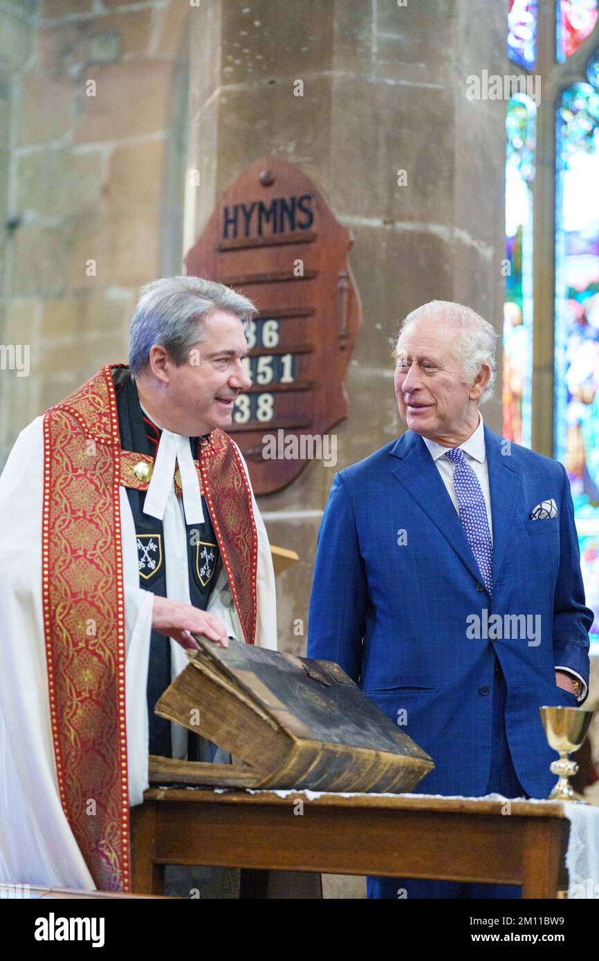 King Charles III is shown a first edition King James Bible and a rare