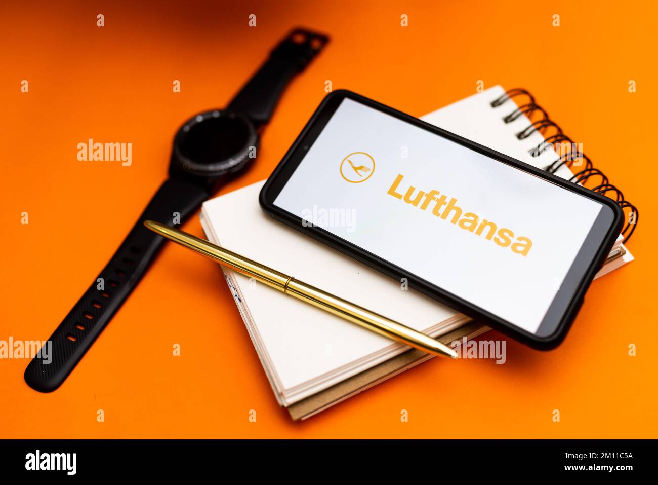 In this photo illustration a Lufthansa logo seen displayed on a smartphone. Stock Photo