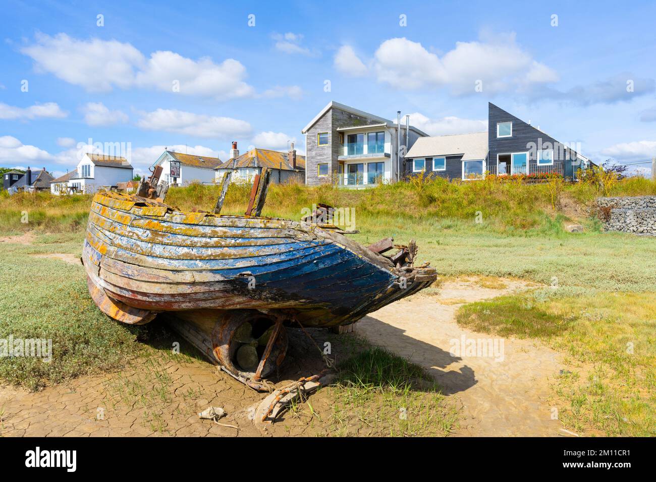 Rye harbour Old fishing boat moored on the Intertidal river banks of the River Rother at Rye Harbour village old boat Rye Sussex England UK GB Europe Stock Photo