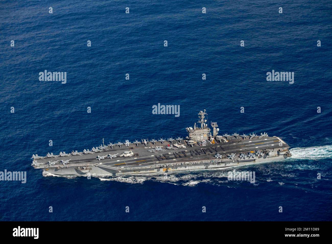USS Nimitz, United States. 08th Dec, 2022. U.S. Navy sailors form the phrase “Beat Army” on the flight deck of the Nimitz-class aircraft carrier USS Nimitz in support of the annual Army vs Navy football game, December 8, 2022 on the Pacific Ocean. The traditional college football rivalry between the Army Black Knights and Navy Midshipman is scheduled for December 10th. Credit: MC3 Samuel Osborn/U.S. Navy/Alamy Live News Stock Photo