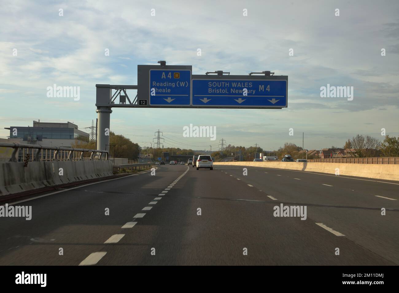 A small section of Smart Motorway where the motorway reverts to a normal three lane motorway. Stock Photo