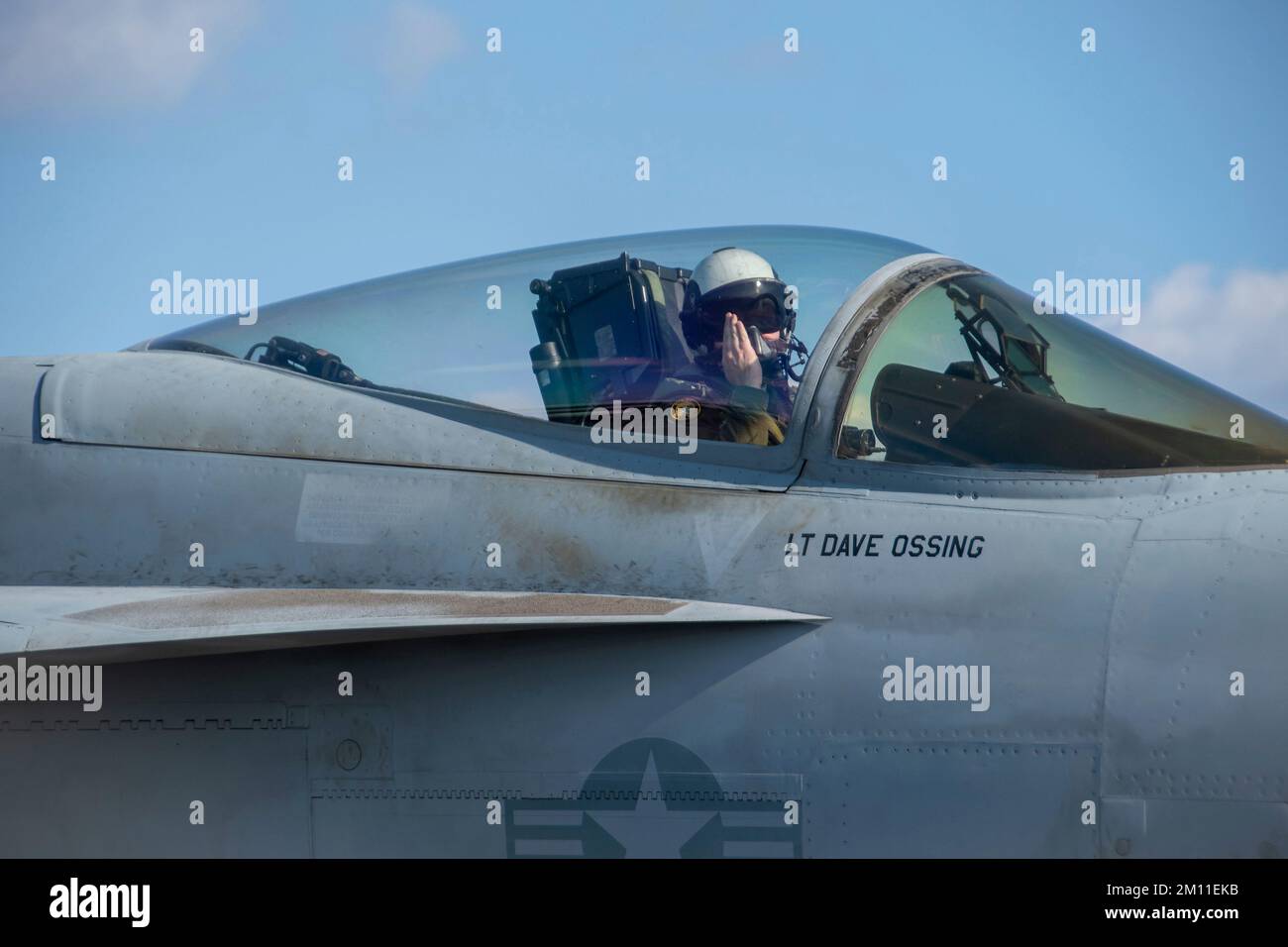 Philippine Sea, United States. 09th Dec, 2022. U.S. Navy pilot Lt. Dillon Hamrick salutes before launching his F/A-18E Super Hornet fighter aircraft attached to the Royal Maces of Strike Fighter Squadron 27, from the flight deck of the Nimitz-class aircraft carrier USS Ronald Reagan underway, December 9, 2022 operating on the Philippine Sea. Credit: MC3 Dallas Snider/U.S. Navy/Alamy Live News Stock Photo