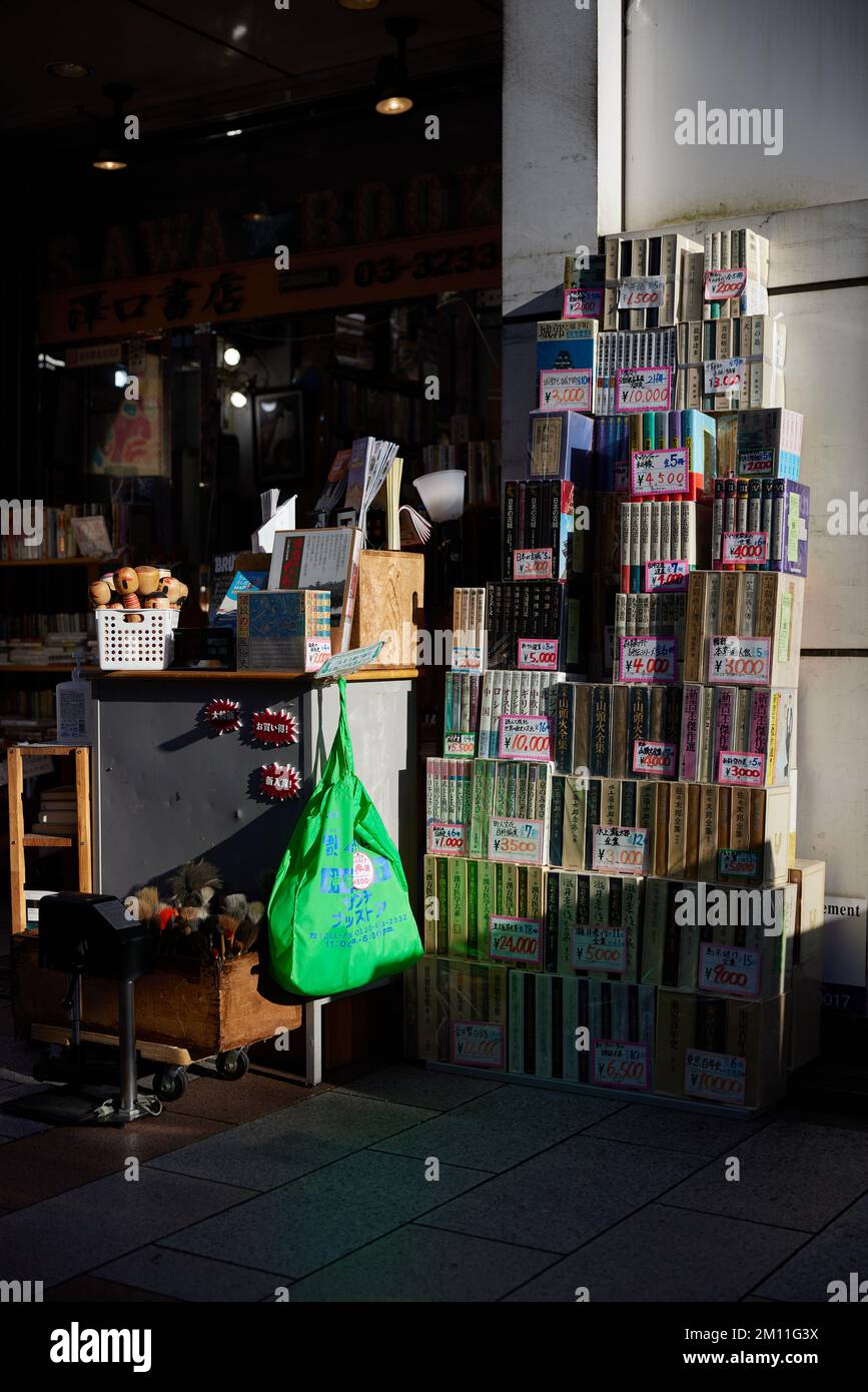 Books outside antiquarian bookshops in Jinbocho, Tokyo, Japan Stock Photo