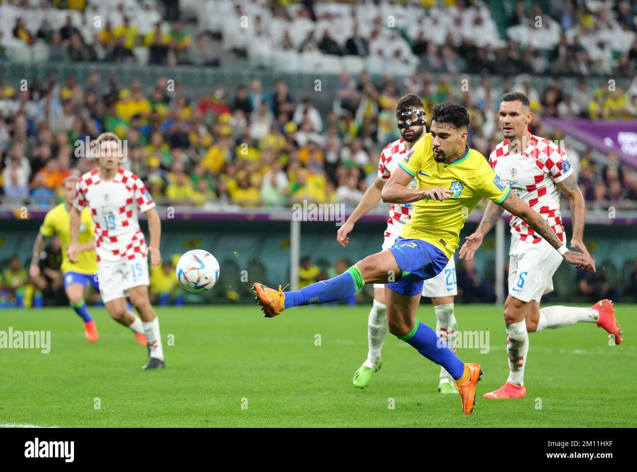 Brazil's Lucas Paqueta attempts a shot on goal during the FIFA World Cup Quarter-Final match at the Education City Stadium in Al Rayyan, Qatar. Picture date: Friday December 9, 2022. Stock Photo