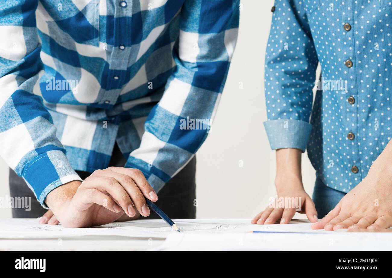 Design Talk Design project discussing in architecture studio Stock Photo - Alamy