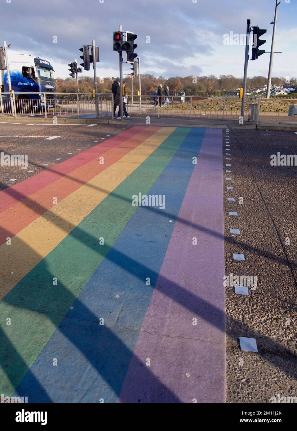 Ireland, North, Derry City, Pedestrian crossing decorated with rainbow colours. Stock Photo