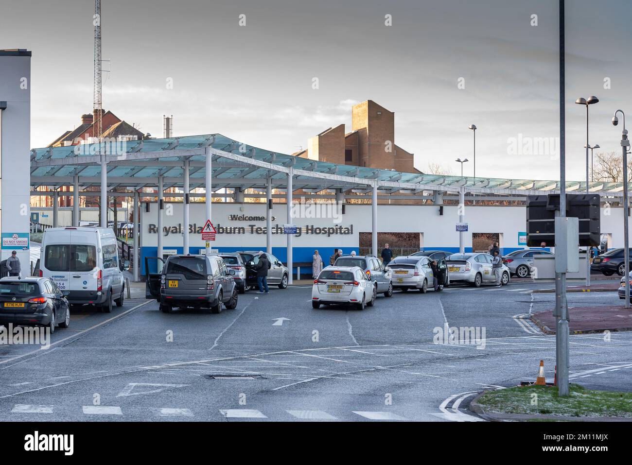 Taken at Royal Blackburn Teaching Hospital, Blackburn, Lancashire, UK on 9 Dec 2022. Entrance and drop off point for hospital patients and visitors. Stock Photo