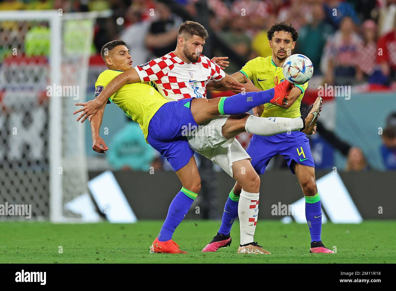 Al Rayyan, Qatar. 09th Dec, 2022. 9th December 2022: Education City Stadium, Al Rayyan, Qatar: FIFA World Cup football, quarter finals, Croatia versus Brazil: Bruno Petkovic of Croatia with a high boot along with Thiago Silva as the ball pops up Credit: Action Plus Sports Images/Alamy Live News Credit: Action Plus Sports Images/Alamy Live News Credit: Action Plus Sports Images/Alamy Live News Stock Photo