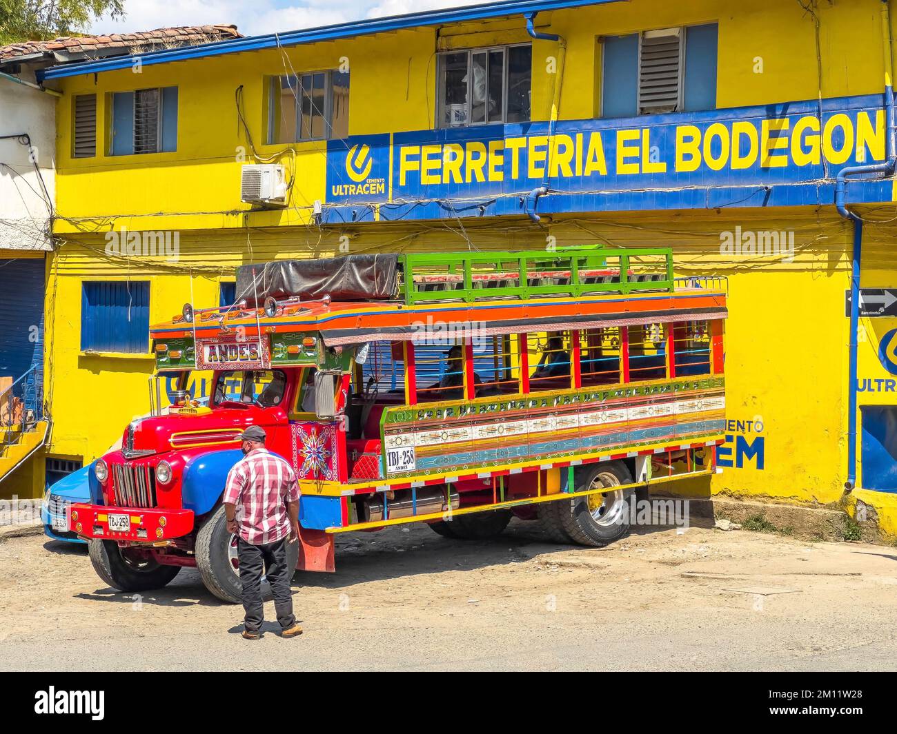South America, Colombia, Departamento Antioquia, Colombian Andes, Andes, Typical 'Chiva' Bus in the Andes Village Stock Photo