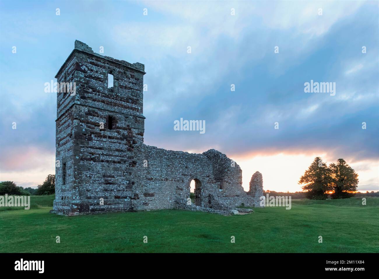 England, Dorset, The Ruins of Knowlton Church and Earthworks near Wimbourne Minster at Sunrise Stock Photo
