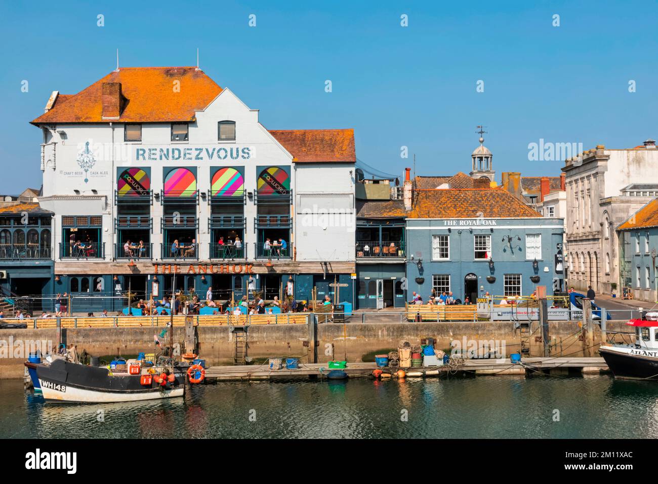 England, Dorset, Weymouth, Weymouth Harbour, Custom House Quay, Restaurants and Pubs Stock Photo