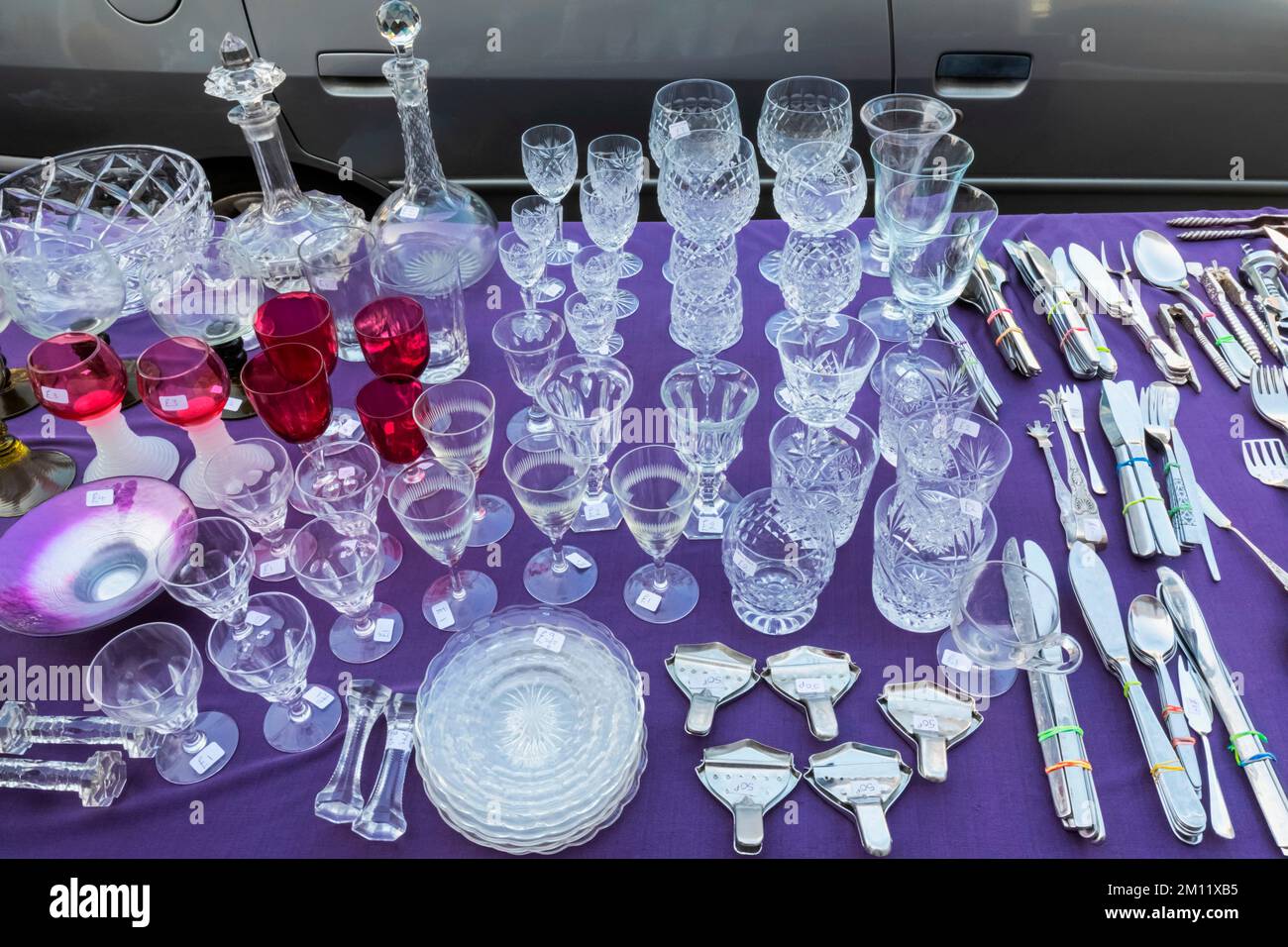 England, Dorset, Bridport, Bridport Market, Display of Antique Glasses and Tableware Stock Photo
