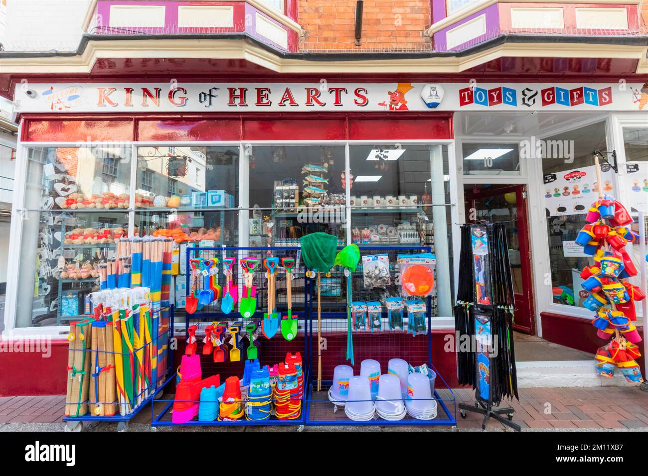 Shop display of buckets and spades and assorted beach toys hires stock