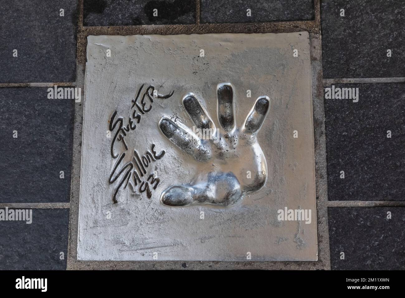 France, French Riviera, Cote d'Azur, Cannes, Palais des Festivals, Sidewalk Handprint of Sylvester Stallone Stock Photo