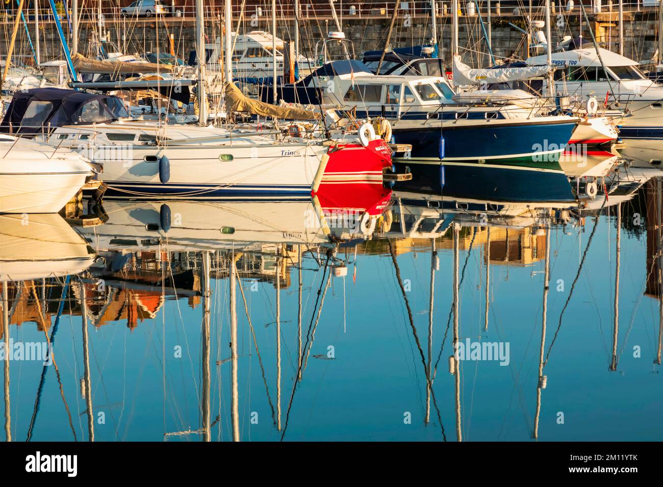 England, Kent, Ramsgate, Ramsgate Yacht Marina and Town Skyline, Reflection of Yachts in the Water Stock Photo