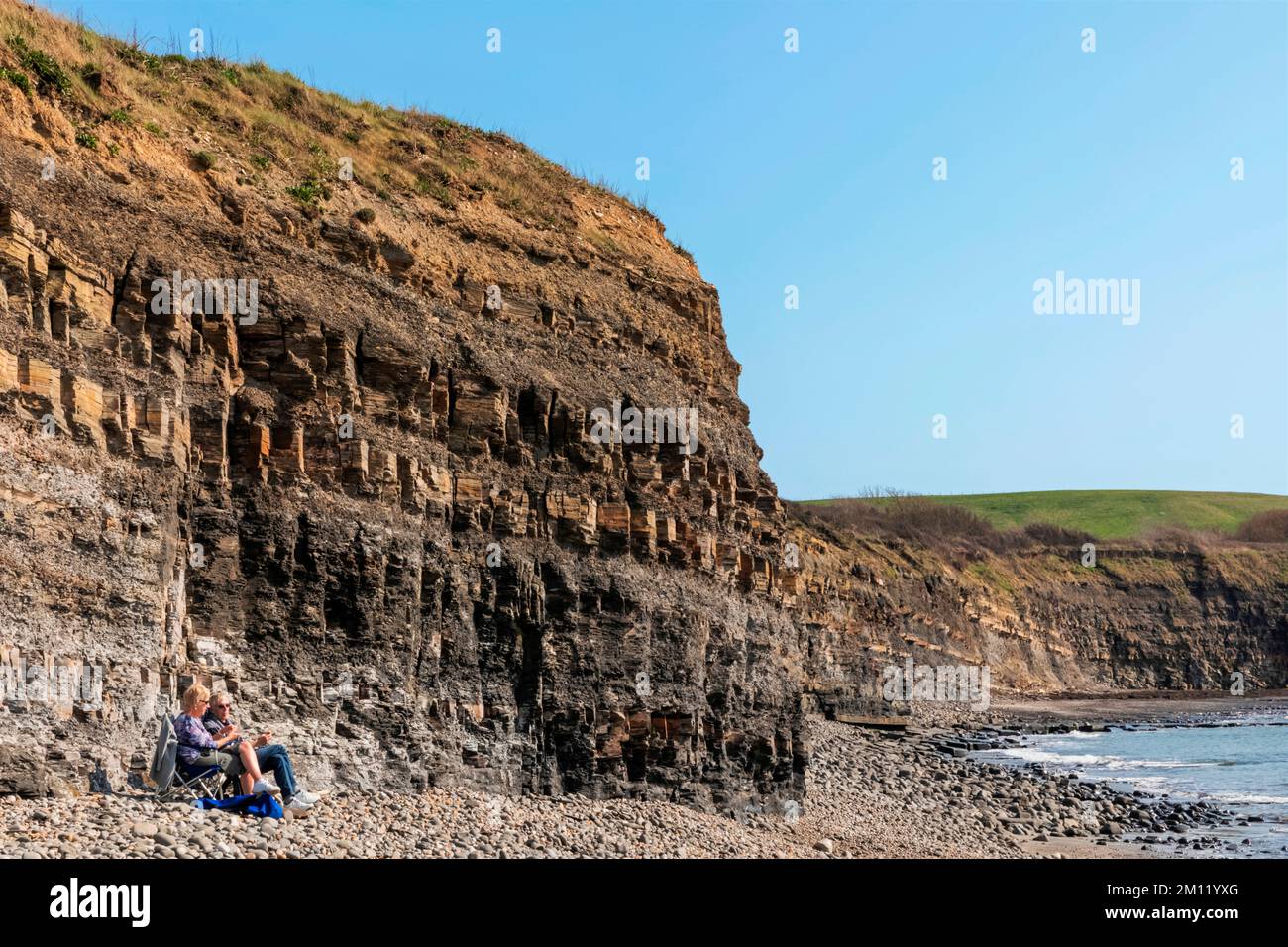 England, Dorset, Isle of Purbeck, Kimmeridge Bay Jurassic Coast World Heritage Site, The Beach and Cliffs Stock Photo