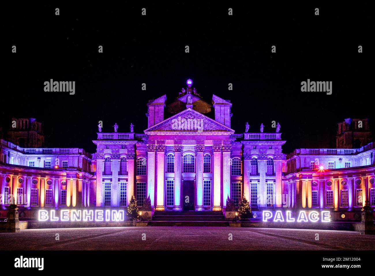 The palace at Blenheim illuminated with Christmas and winter lights. Stock Photo