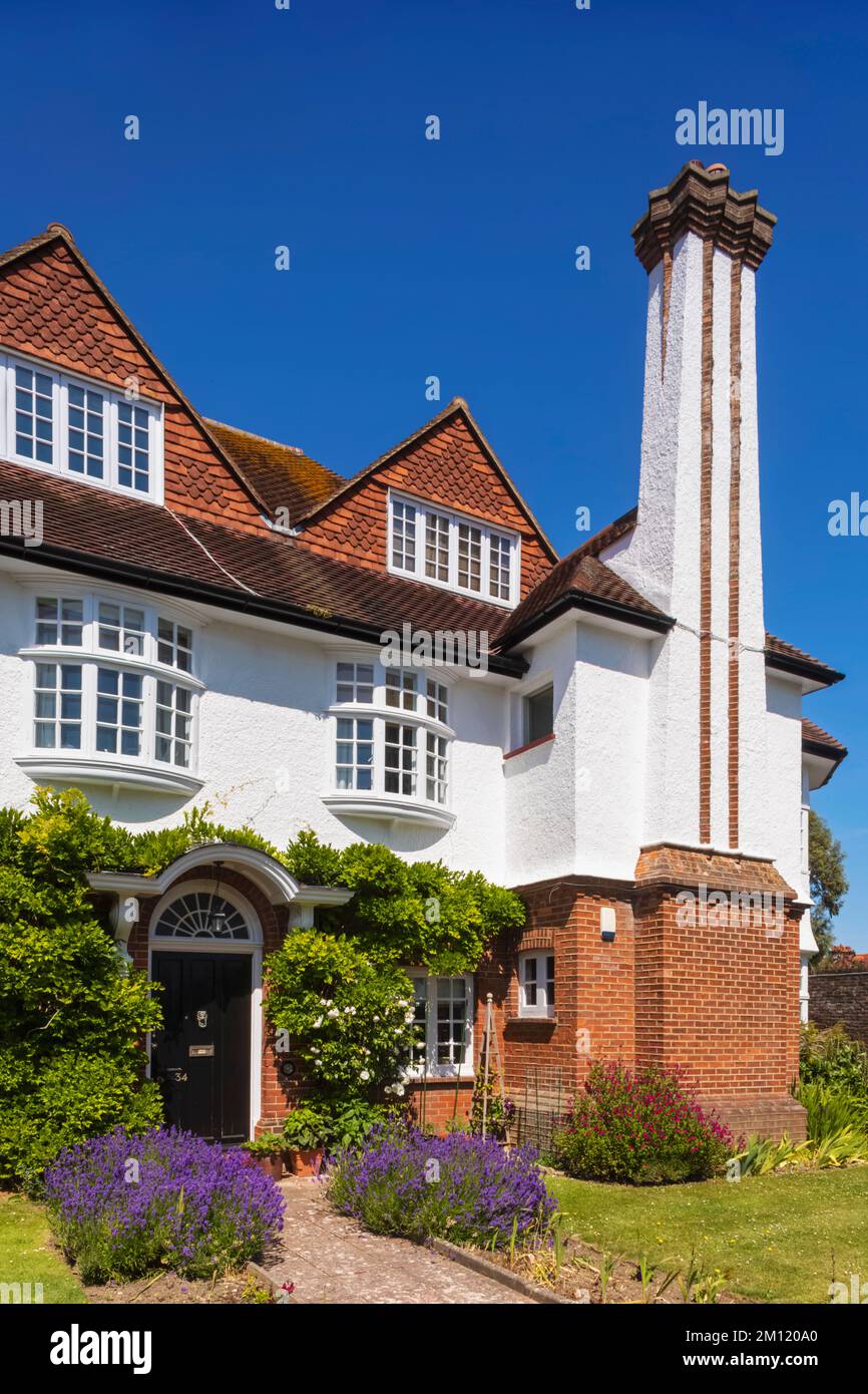 England, East Sussex, Eastbourne, Residential House with Tall Exterior Chimney Stock Photo