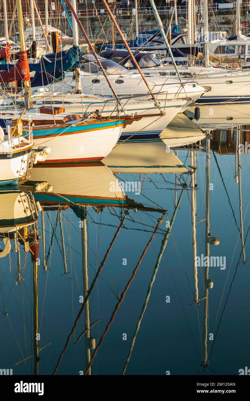 England, Kent, Ramsgate, Ramsgate Yacht Marina and Town Skyline, Reflection of Yachts in the Water Stock Photo