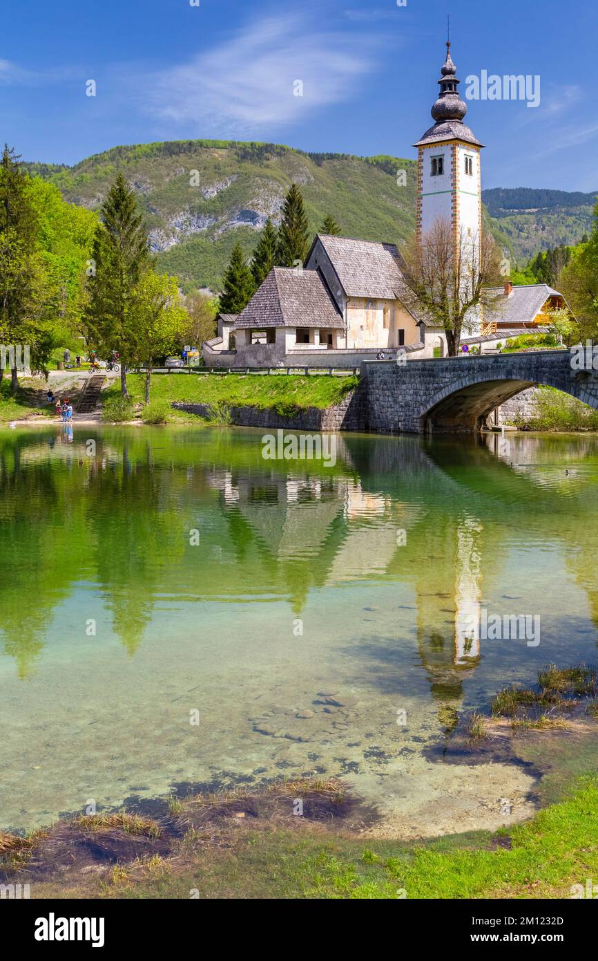 Church of St. John the Baptist and the stone bridge by the Bohinj lake