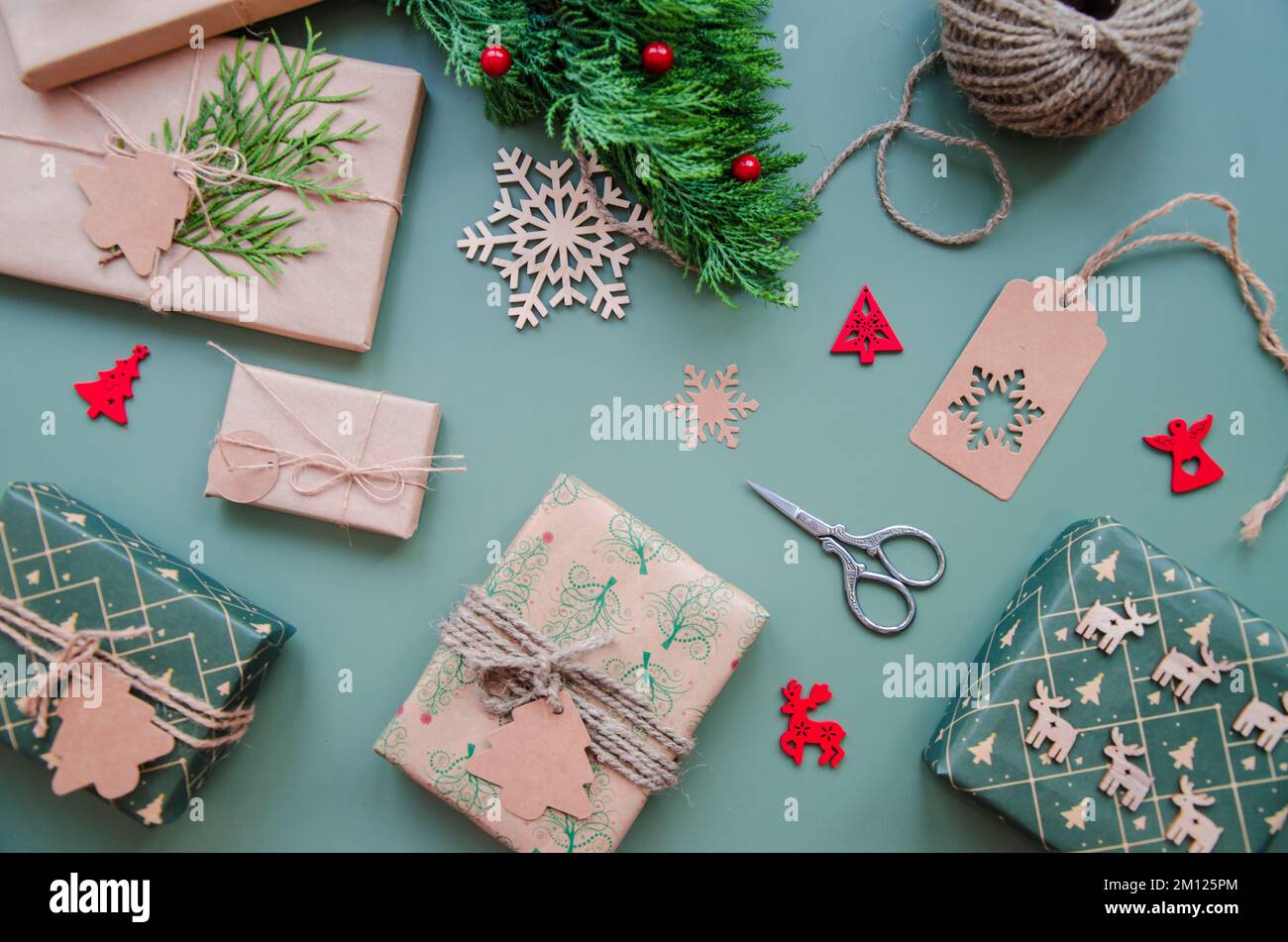 Eco friendly Christmas composition with gift boxes in craft reusable ...