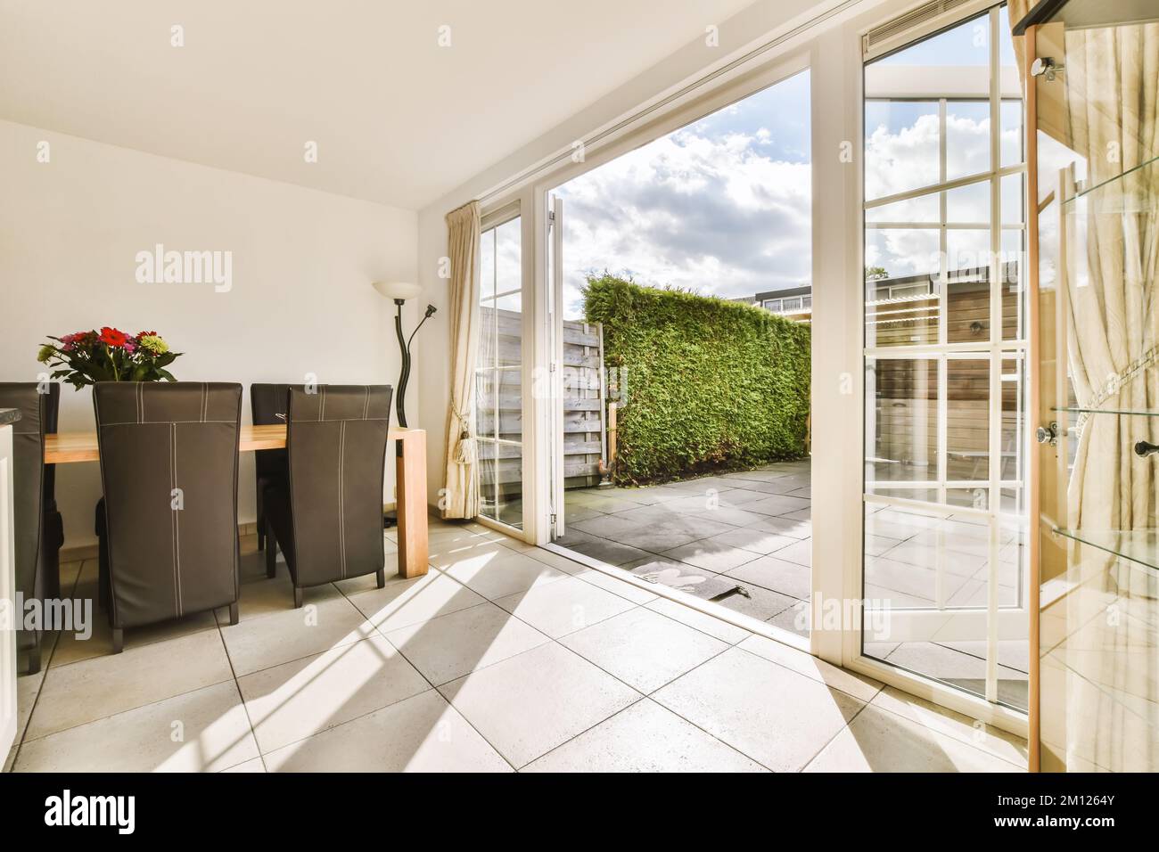 Snapshot of High Ceiling Scandinavian Apartments With Patio Doors Leading To Outdoor Spaces