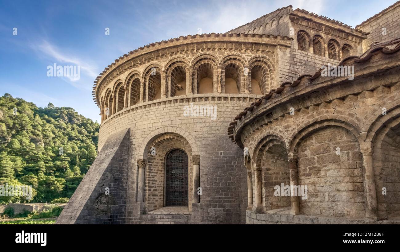 Monastery of Gellone in Saint Guilhem le Désert. The monastery site was built in the IX century and is designated as part of the UNESCO World Heritage 'Way of Saint James in France'. The village belongs to the Plus Beaux Villages de France. Stock Photo