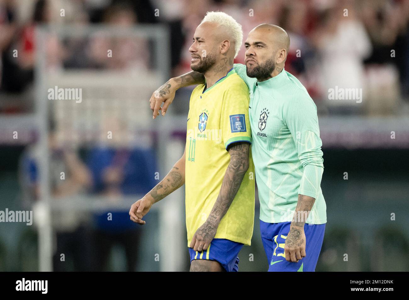 Doha, Qatar. 09th Dec, 2022. Doha, Qatar. 09th Dec, 2022. Neymar Jr and Dani Alves of Brazil look dejected after their sides' elimination from the tournament after a penalty shoot out loss during the FIFA World Cup Qatar 2022 quarter final match between Croatia and Brazil at Education City Stadium on December 09, 2022 in Doha, Qatar. Photo by David Niviere/ABACAPRESS.COM Credit: Abaca Press/Alamy Live News Credit: Abaca Press/Alamy Live News Credit: Abaca Press/Alamy Live News Stock Photo